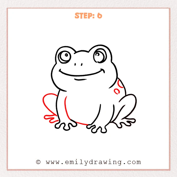 how to draw a cartoon frog - A cartoon frog with both back legs shown, a curved belly line between the front feet, and small round spots added on the frog’s shoulder.